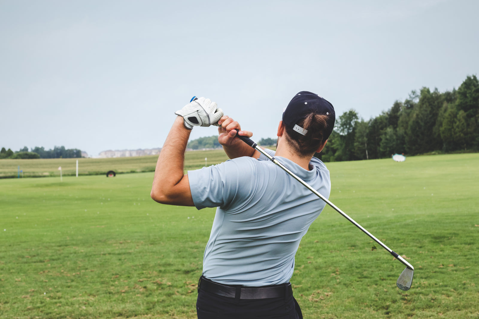 A golfer's full swing follow-through